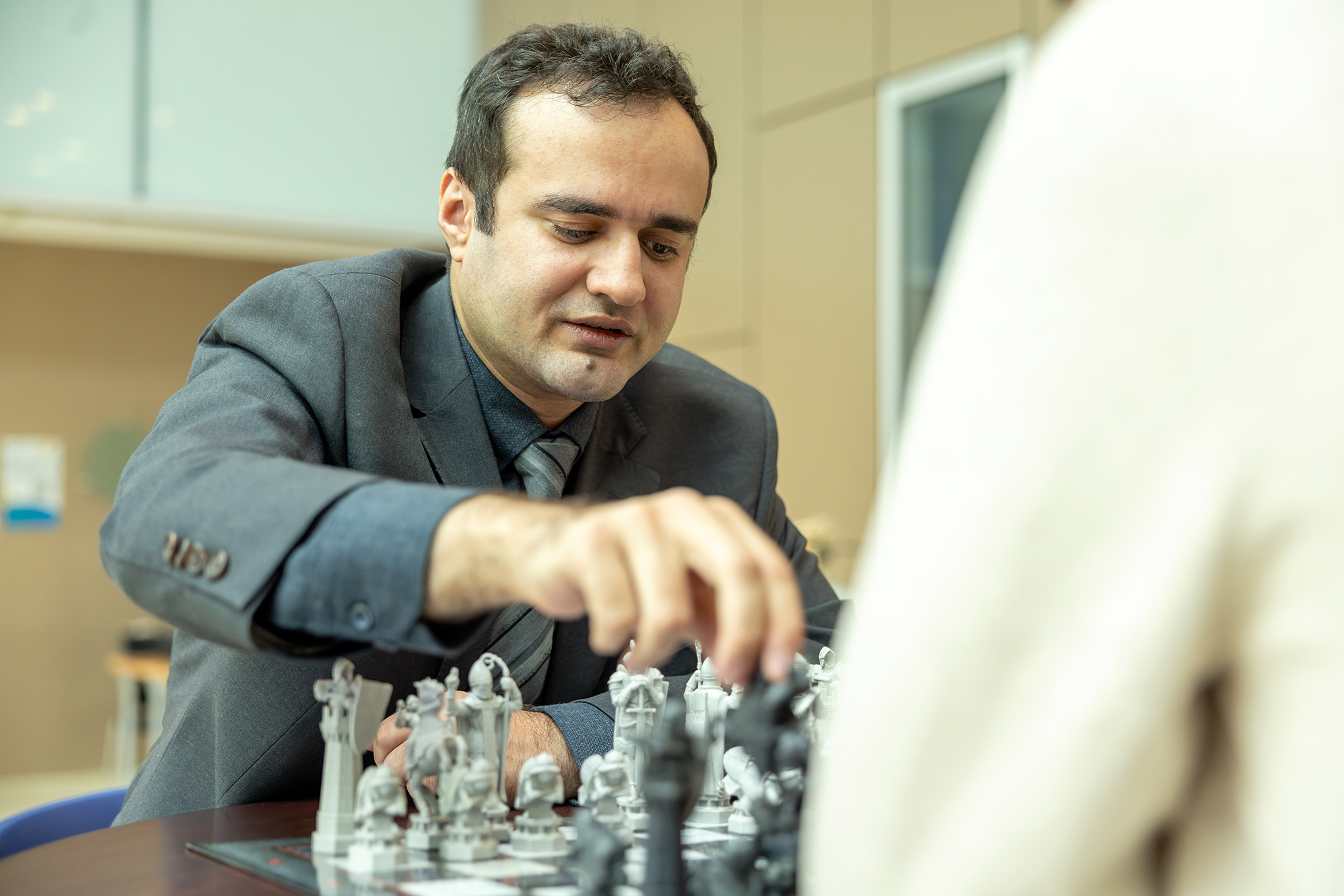 Amir Ardestani-Jaafari playing chess