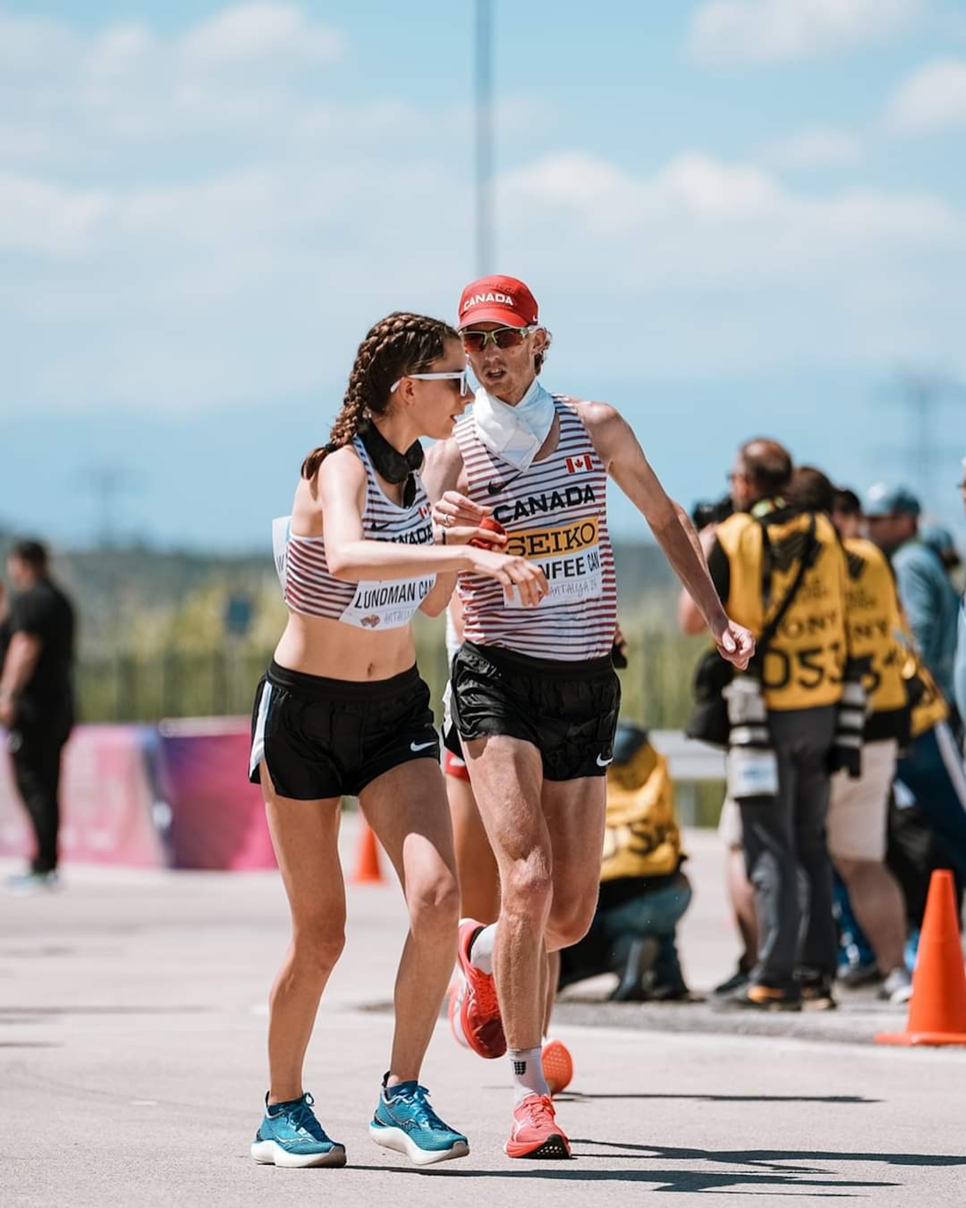 Evan Dunfee and Olivia Lundman on the track