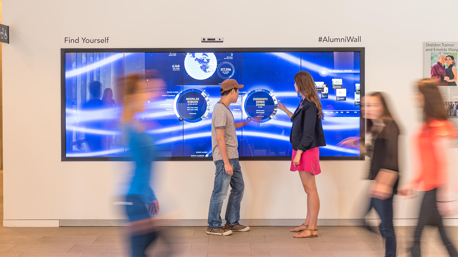 People in front of an interactive wall
