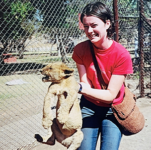 Jennifer Lee holding a lion cub