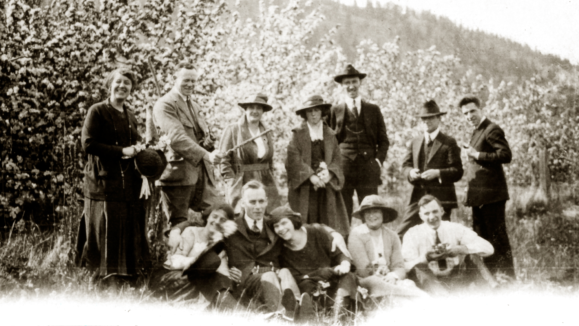 Members of the Players Club pose among the heather on a mountainside