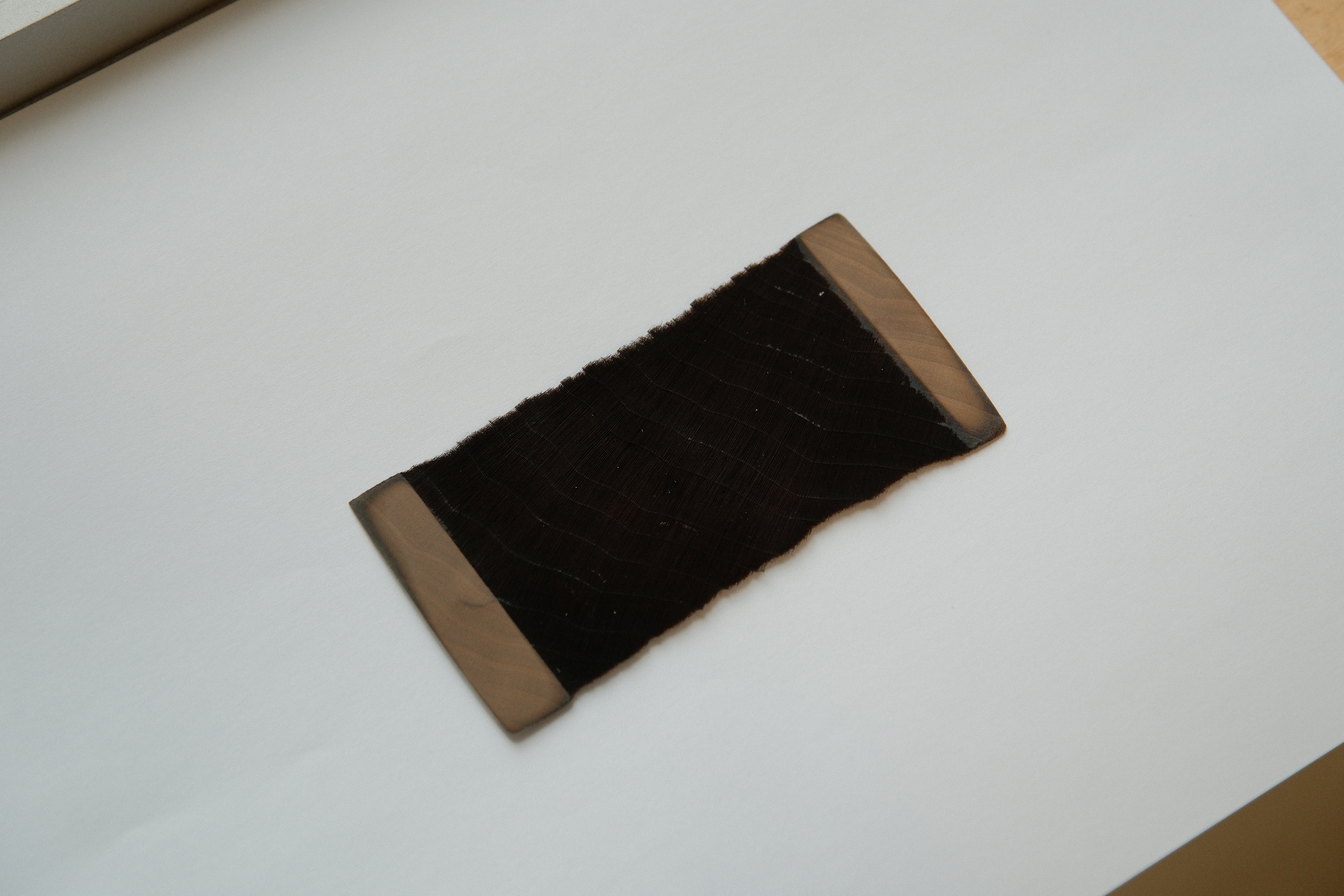 Rectangular sample of super-black wood