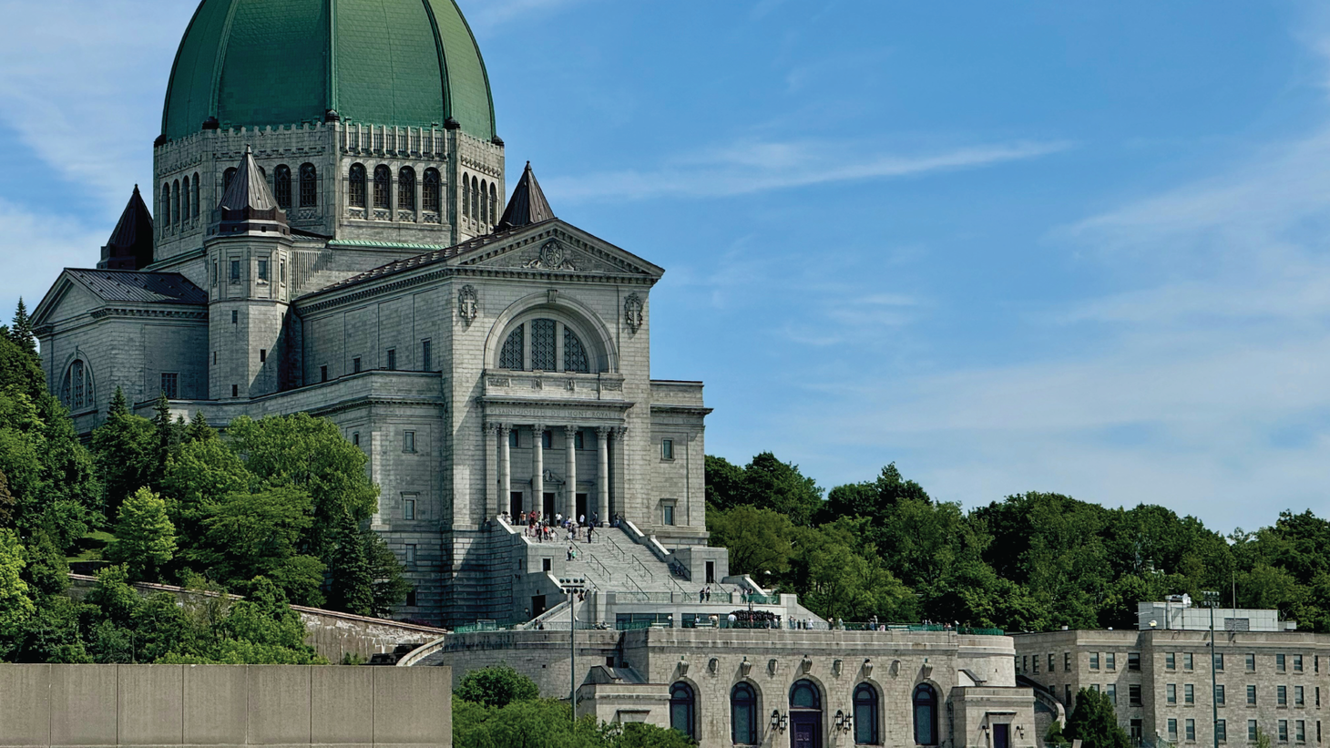 Enormous stone church with patinaed dome