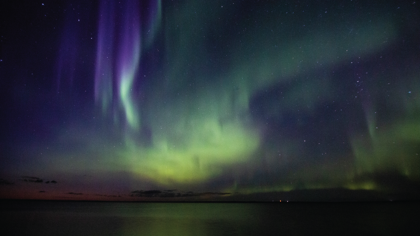 Northern lights over water