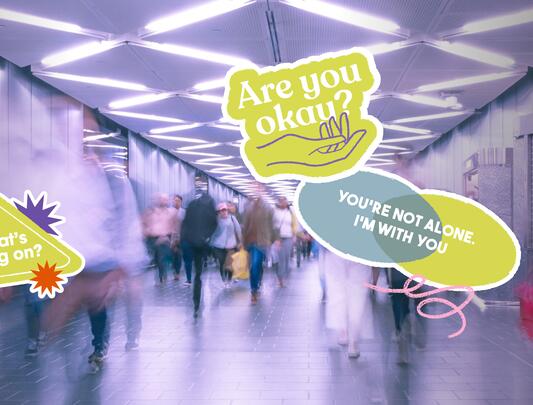 People walking down a hallway. Graphics with copy overlaid over image, with statements like "Are you okay?" and "What's going on?"