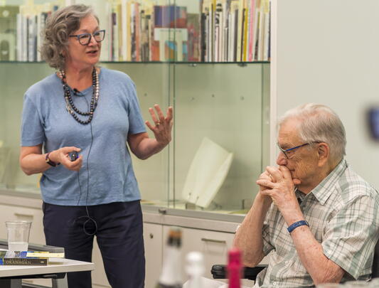 Canadian writer George Bowering listens while his wife Jean Baird talks.