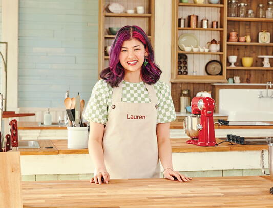 The Great Canadian Baking Show winner Lauren Tjoe in a kitchen