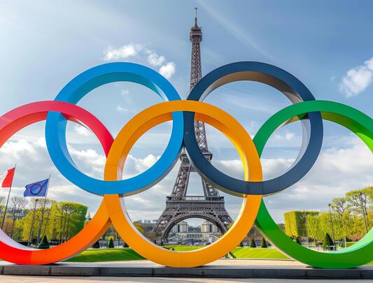 The Olympic rings with the Eiffel Tower in the background