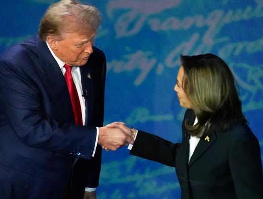 Kamala Harris shakes hands with Donald Trump 