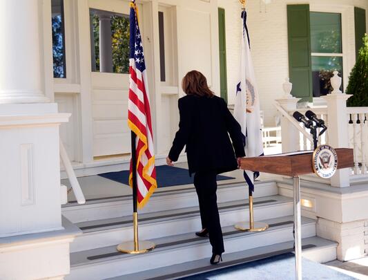 Vice President Kamala Harris ascends stairs at vice president’s residence 