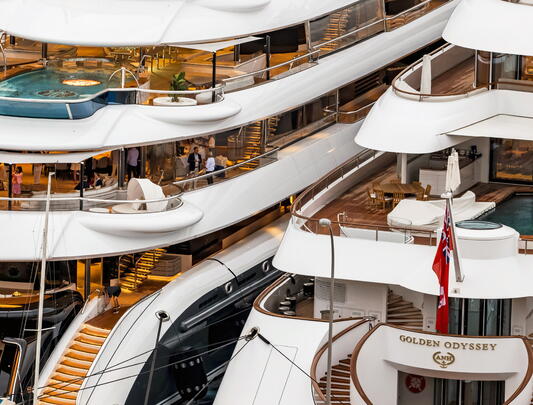 Two luxury yachts next to each other
