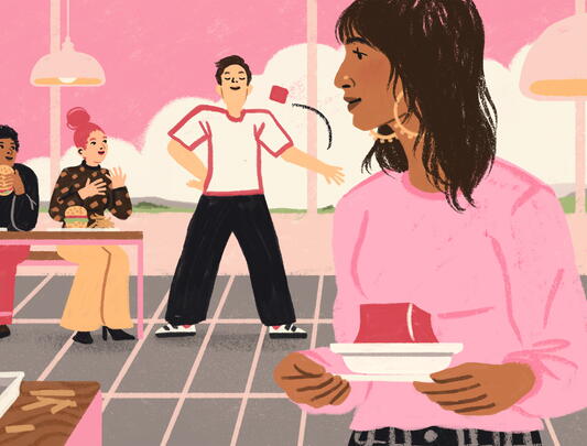 An illustration of a person with shaggy brown hair and a pink sweater holding a plate of red jello and watching another person bounce jello up his arm.