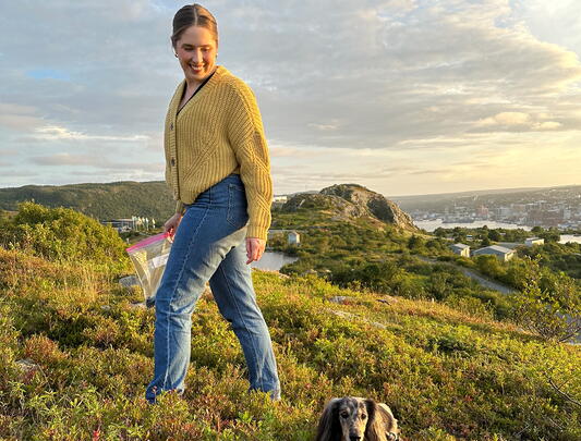 Dr. Amy Dawson on Signal Hill with her dog Watson