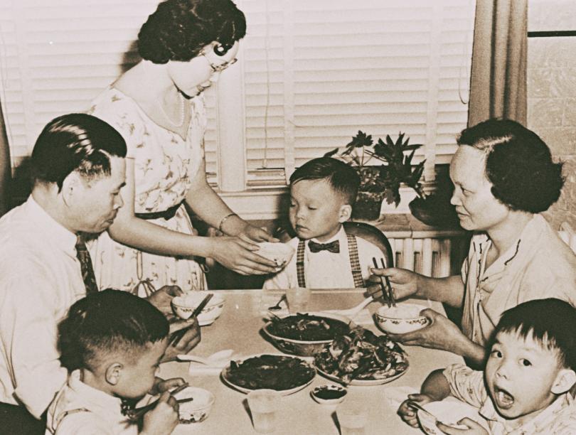 The Lee family sitting down for dinner. Albert Lee, Saint Mary’s University, Gorsebrook Research Institute, GRI_134 (1958)