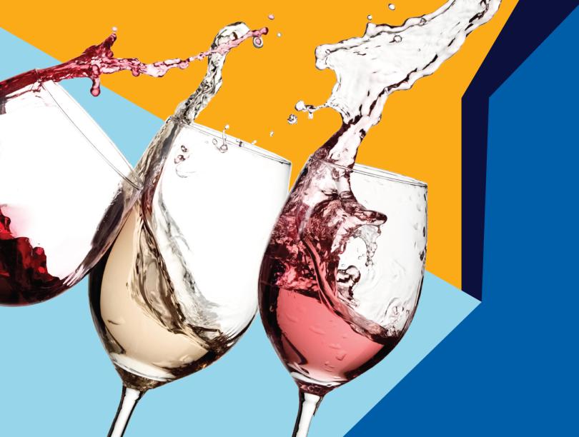Three glasses containing red wine, white wine, and rose. Glasses are tilted with wine splashing out.