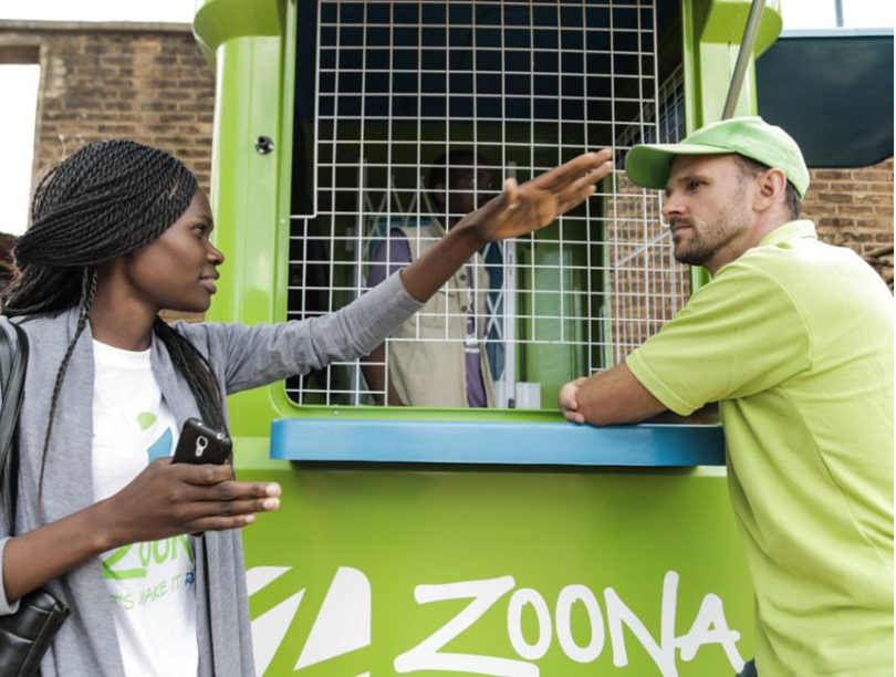 Entrepreneur Mike Quinn with a top Zoona agent in Malawi