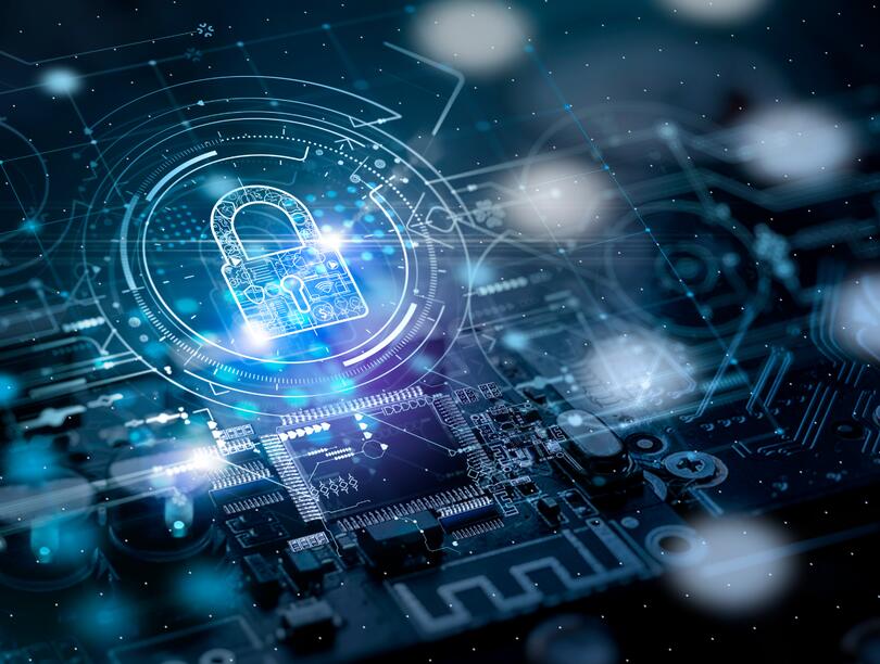 A stylized image of a circuit board with the glowing outline of a padlock in the centre