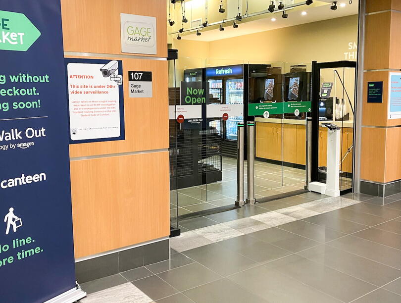 Transparent gates at entrance to convenience store