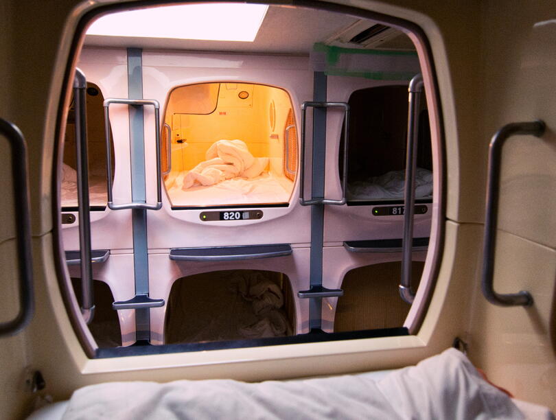 View of sleeping pod at Japanese capsule hotel