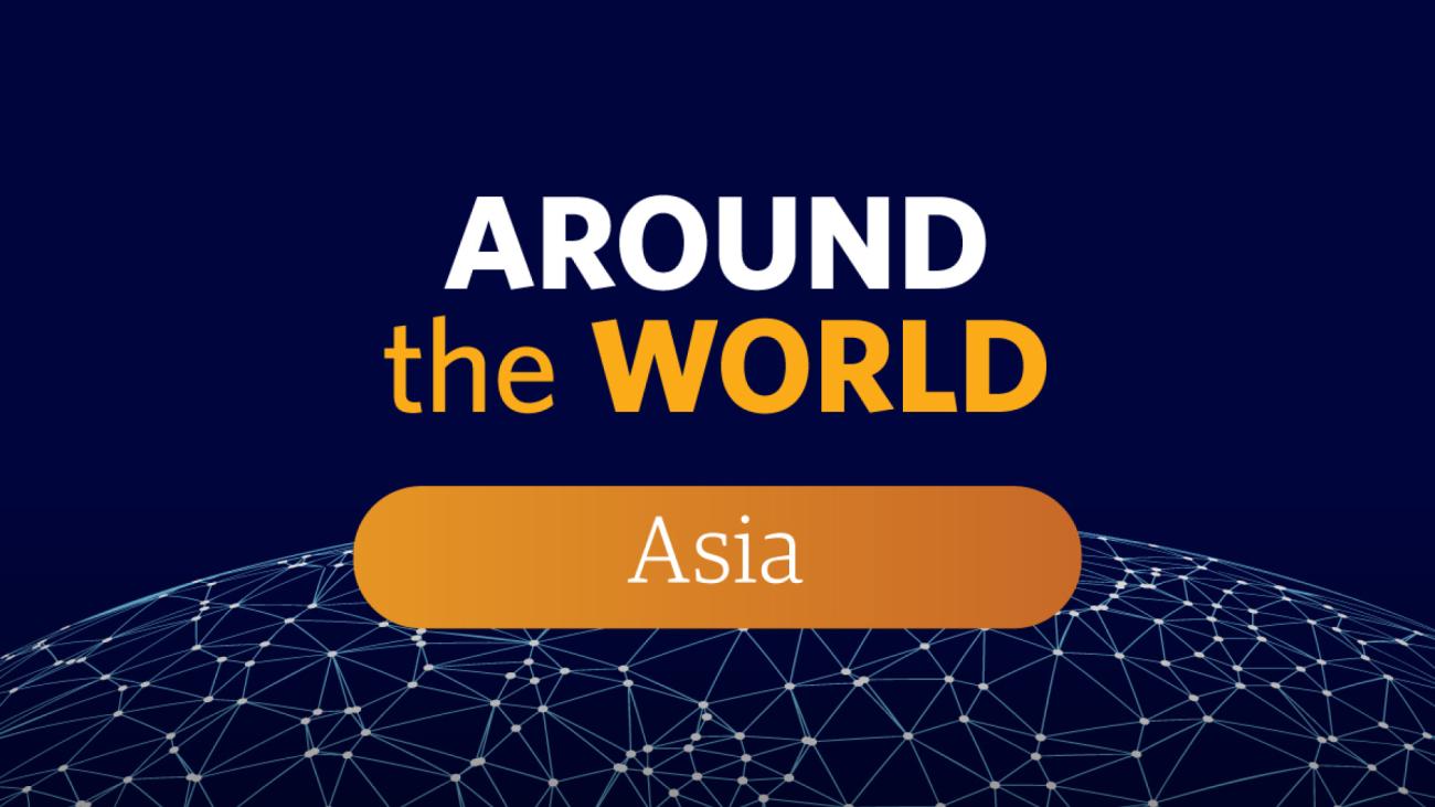 Navy and orange illustration of Around the World Asia text.