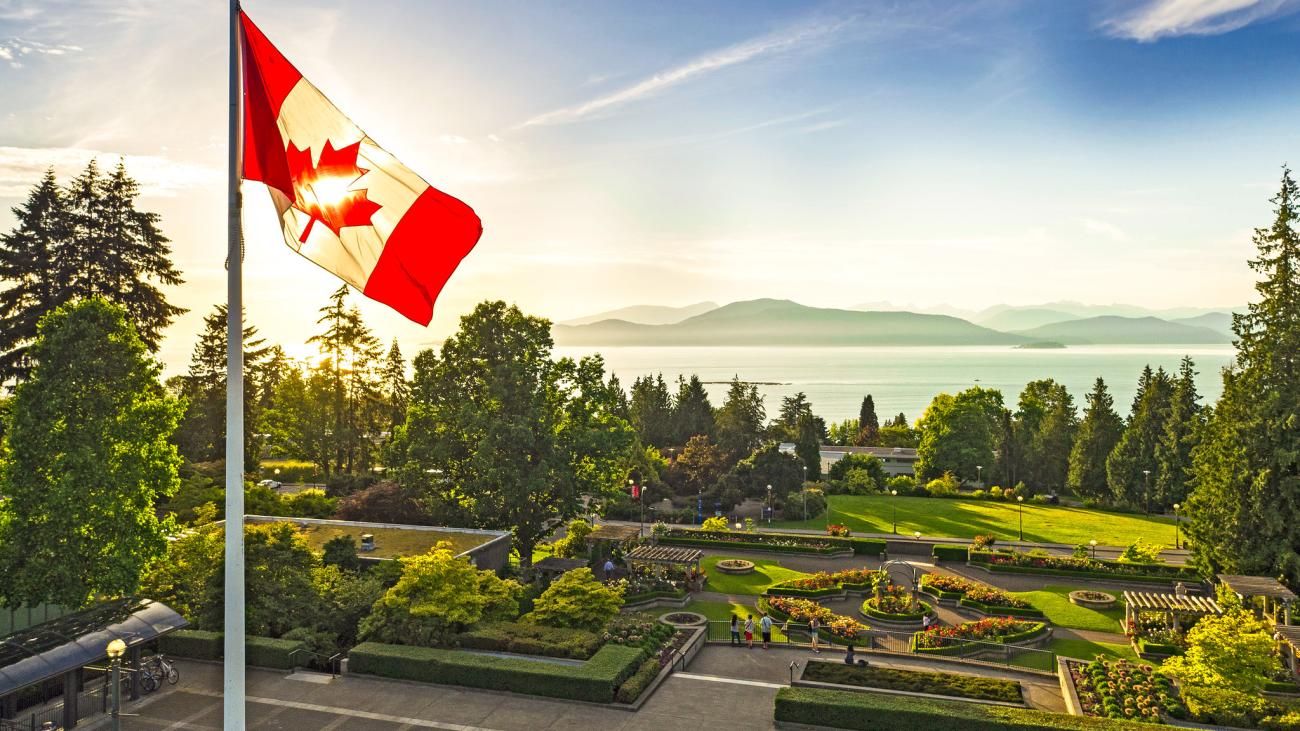 Wide-angle semi-aerial shot of the Rose Garden, with the Canadian flag on the left