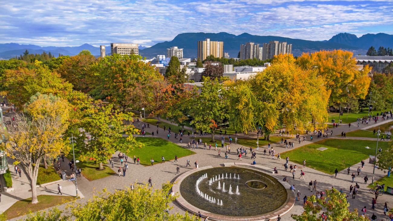 Aerial view of UBC campus during fall, including the Martha Piper Plaza in bottom centre