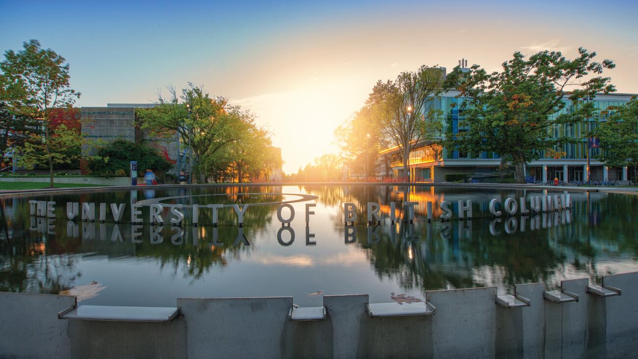 Pool of water between UBC buildings during sunrise