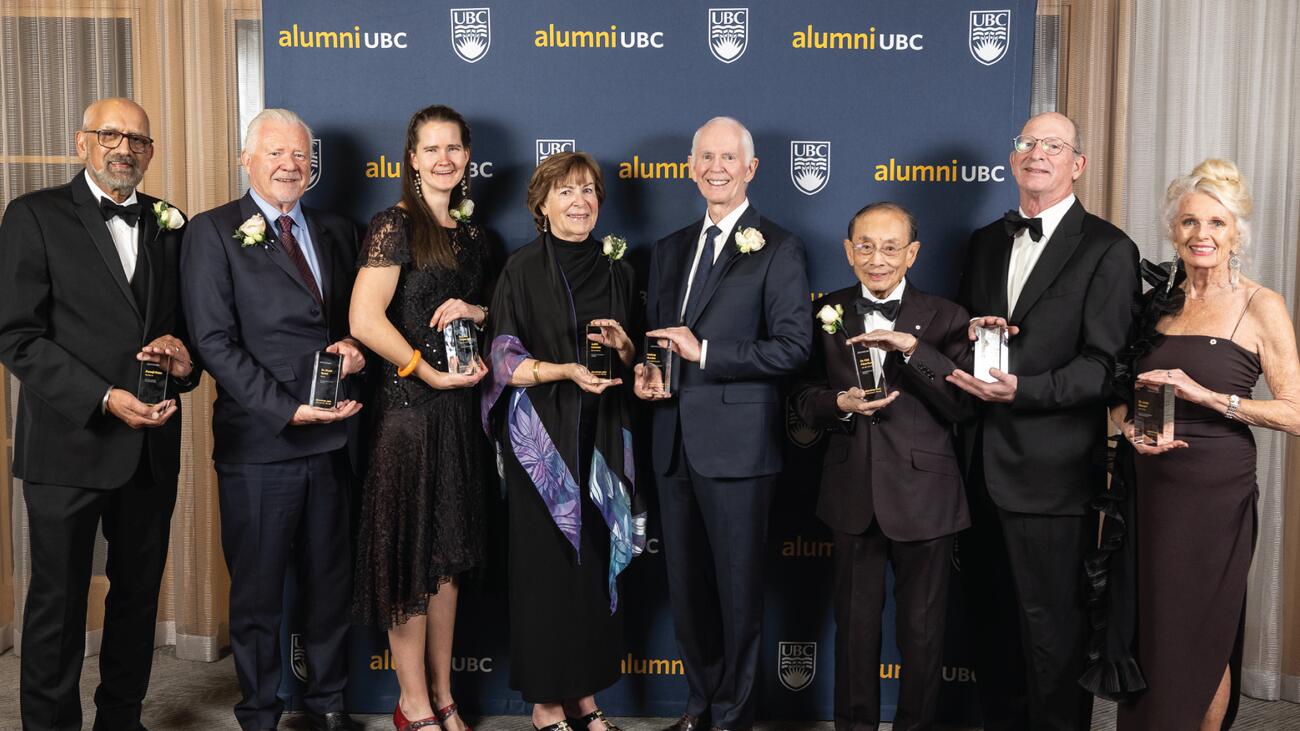 2023 alumni UBC Achievement Awards recipients holding their awards at the gala