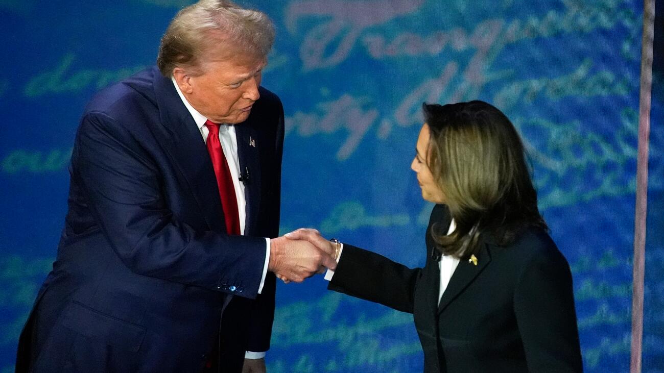 Kamala Harris shakes hands with Donald Trump 