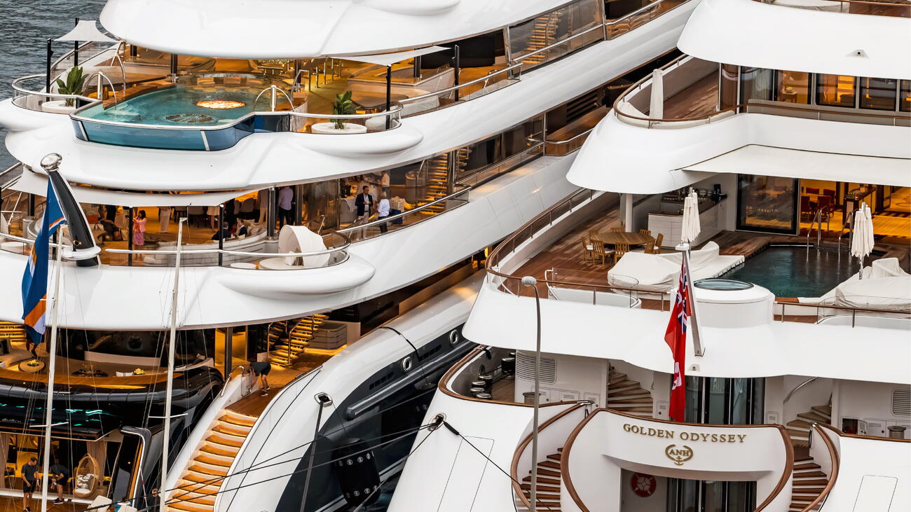 Two luxury yachts next to each other