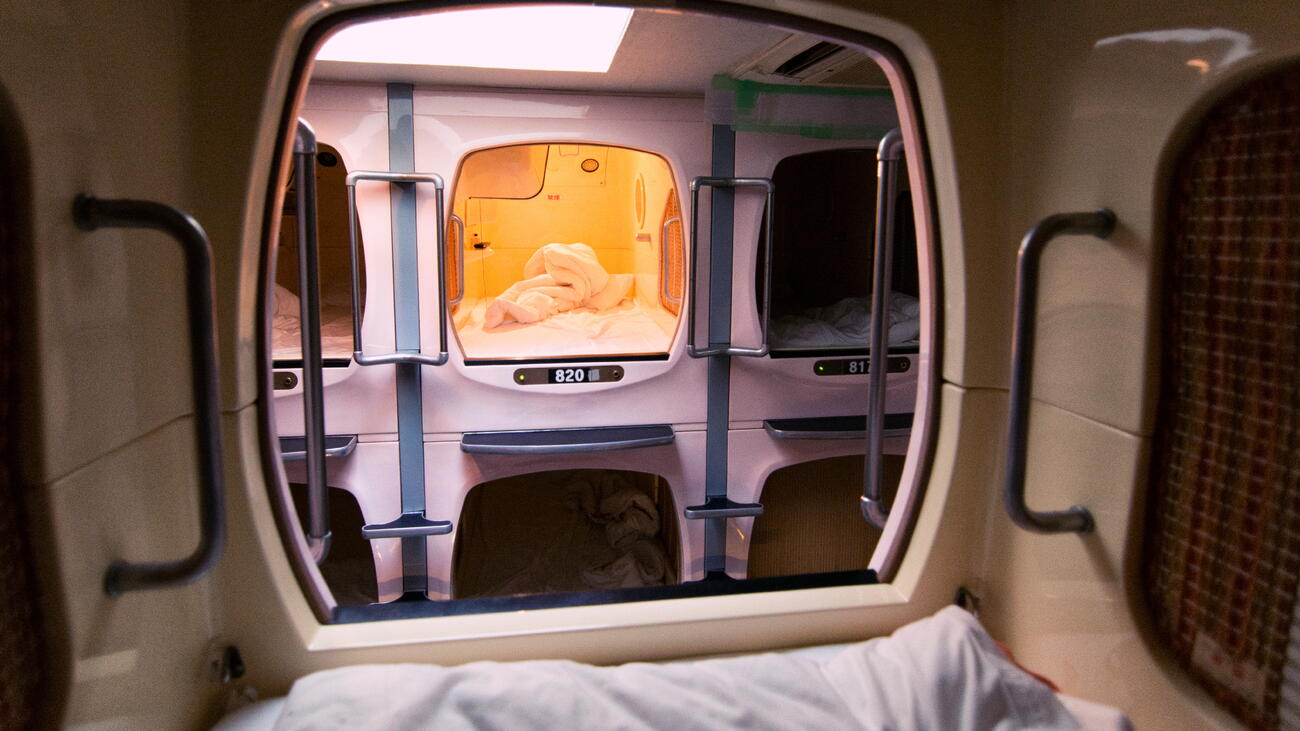 View of sleeping pod at Japanese capsule hotel