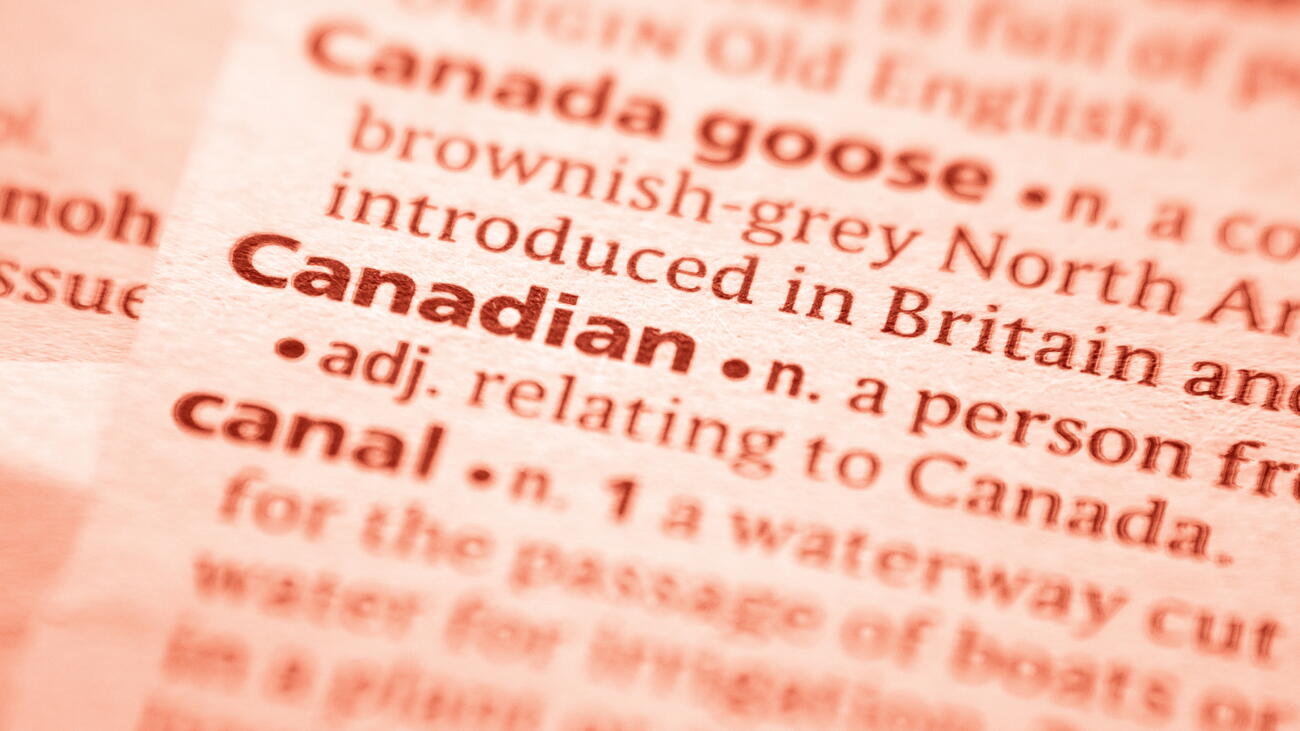 Close-up of "Canadian" entry in dictionary, with red overlay