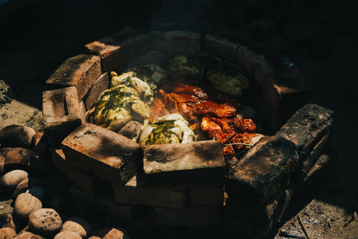Meat cooked via the pachamanca method (i.e. using an "earth oven")