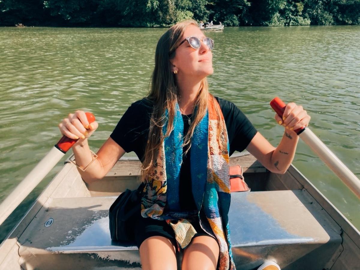 Mikaela Gauer on a rowboat in Central Park on a sunny day