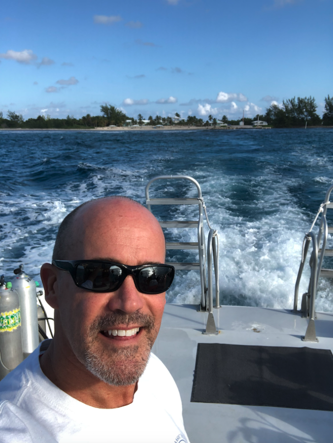 Selfie of Brian Patterson aboard a boat on the water
