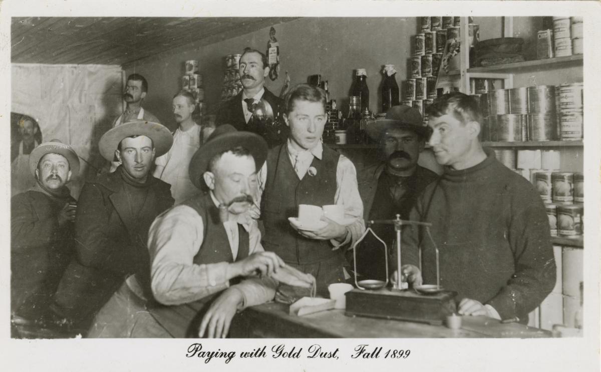 Men gathered in a bar.