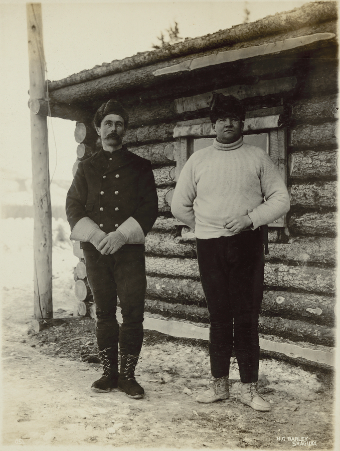 Two miners standing side by side