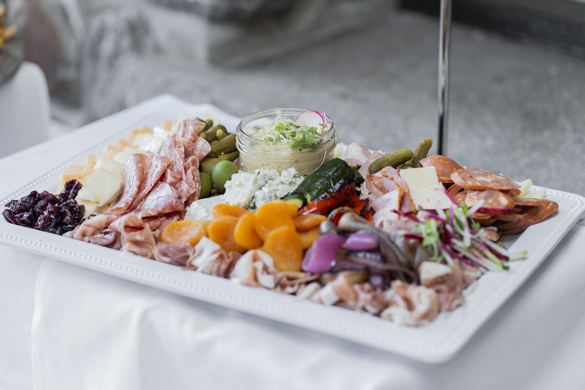 A colourful plate of appetizers on a table