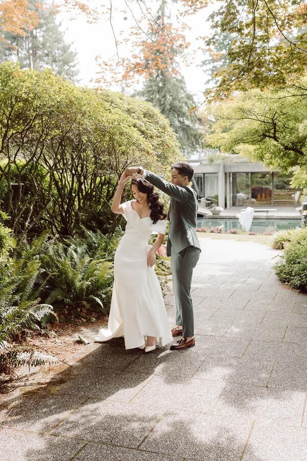 Mariska Sofian and Appu Shrestha in wedding attire, in a candid shot outdoors