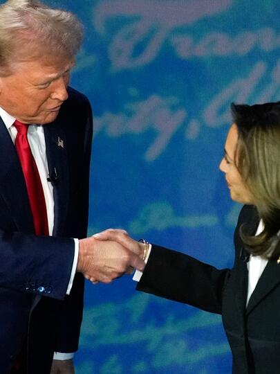 Kamala Harris shakes hands with Donald Trump 