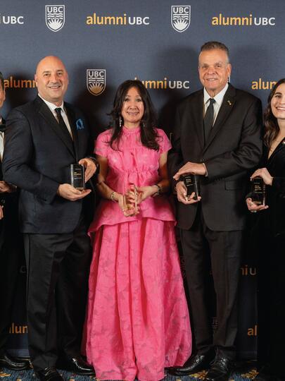 Group shot of the 2024 alumni UBC Achievement Awards Recipient, with each individual holding their award
