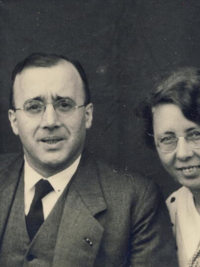 Parents with two girls in black and white photo