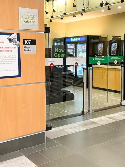 Transparent gates at entrance to convenience store